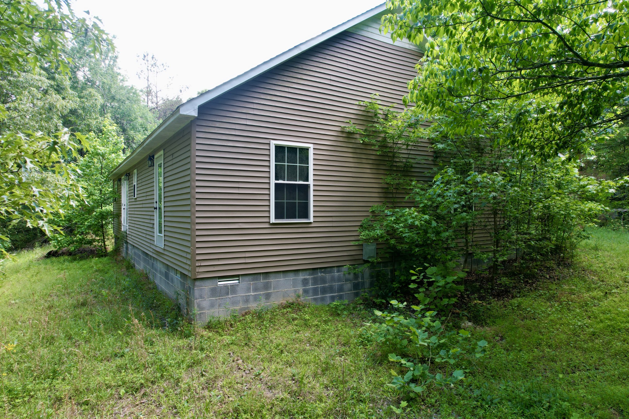 228 Henryville Road Ethridge, TN 38456 - Photo 11 of 55 a view of a house with a yard