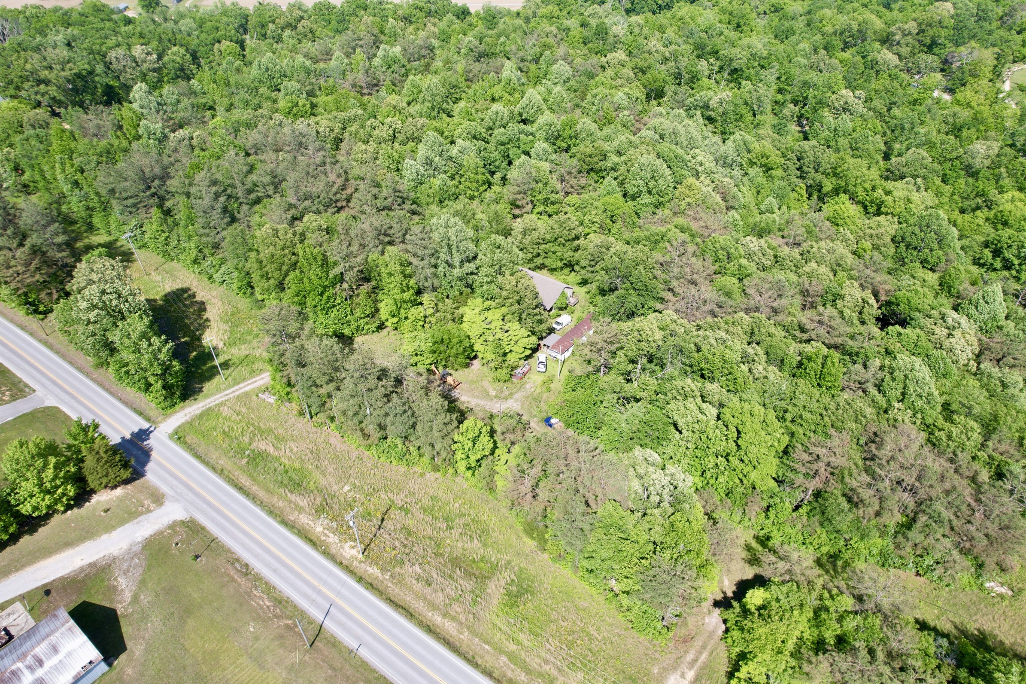 228 Henryville Road Ethridge, TN 38456 - Photo 16 of 55 a view of a yard from a balcony