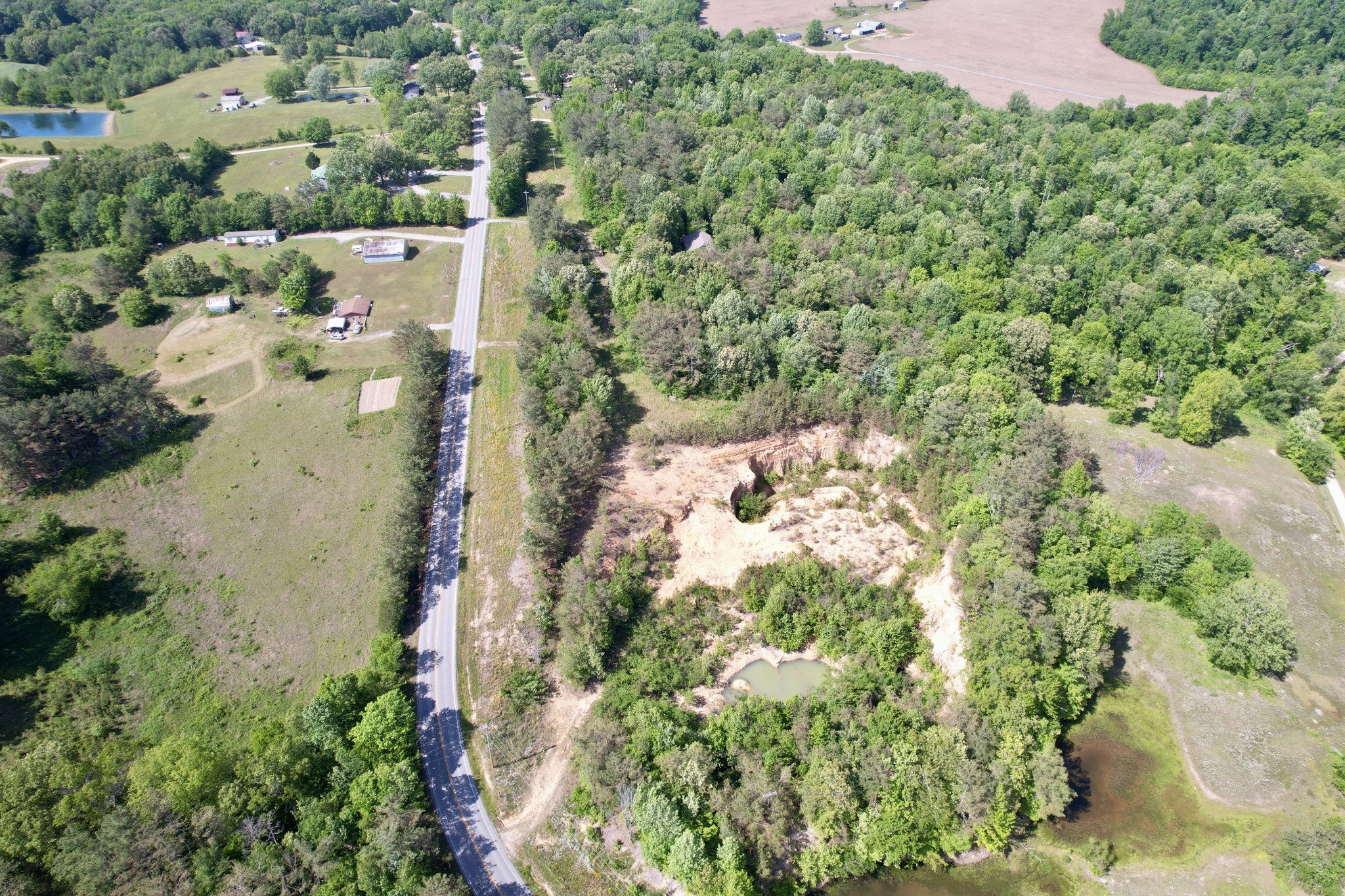 228 Henryville Road Ethridge, TN 38456 - Photo 18 of 55 an aerial view of residential house with parking space