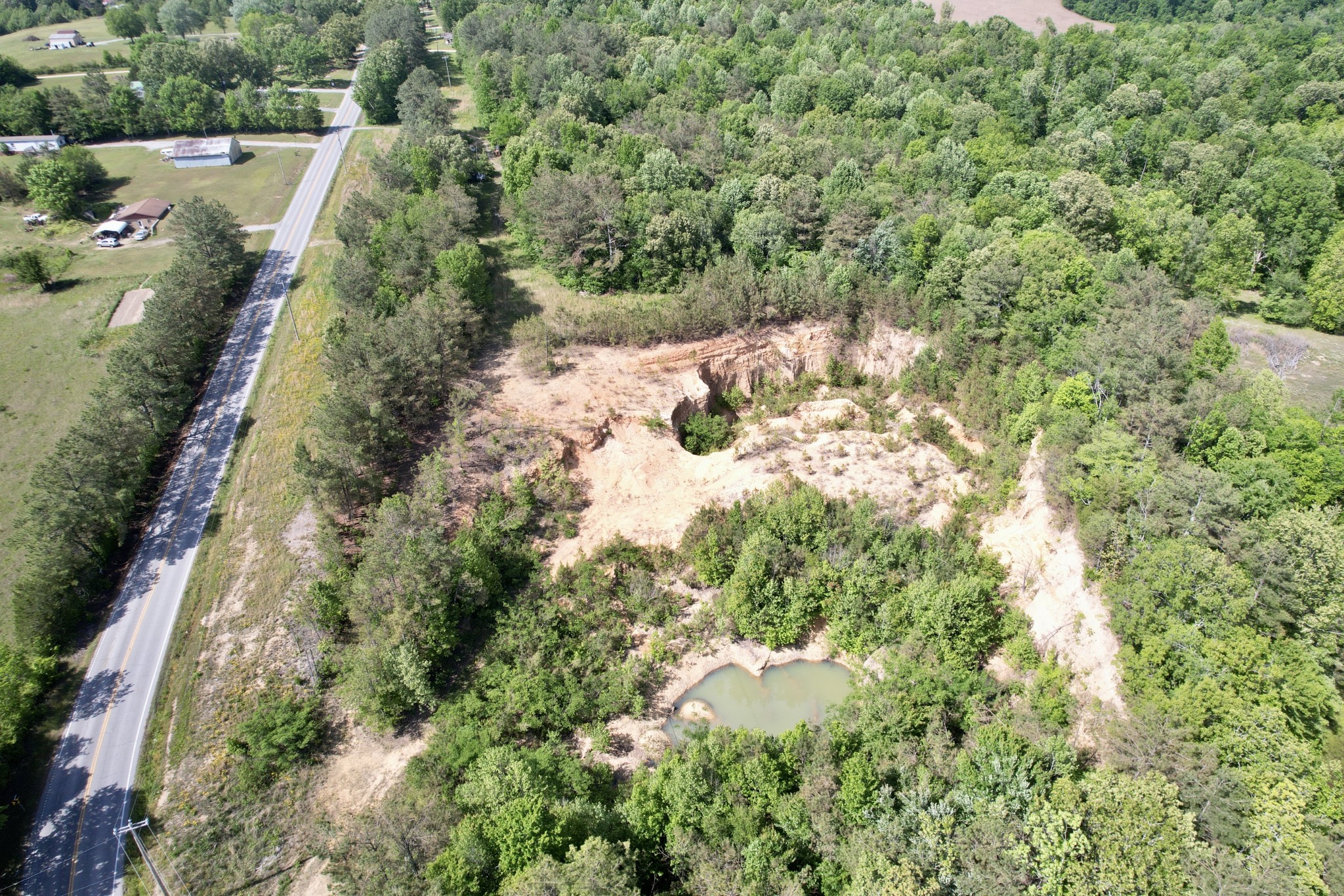 228 Henryville Road Ethridge, TN 38456 - Photo 20 of 55 an aerial view of house with yard and mountain view in back