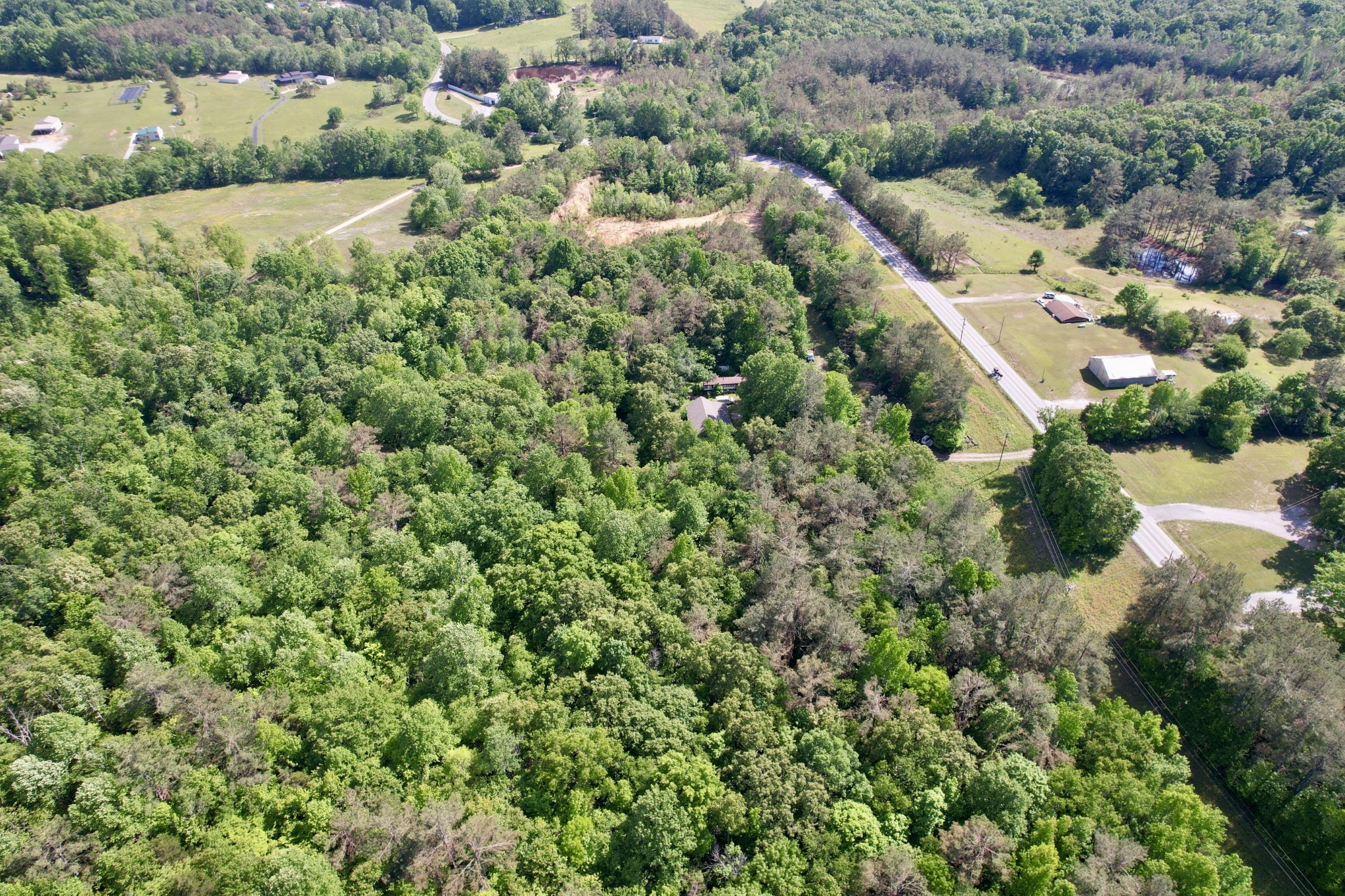 228 Henryville Road Ethridge, TN 38456 - Photo 33 of 55 an aerial view of residential house with outdoor space and trees all around