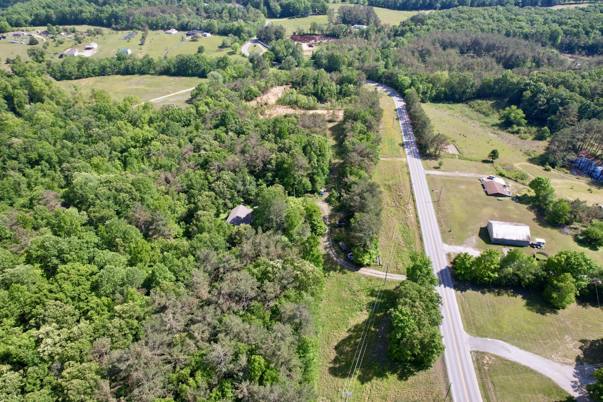228 Henryville Road Ethridge, TN 38456 - Photo 34 of 55 an aerial view of a house with a yard