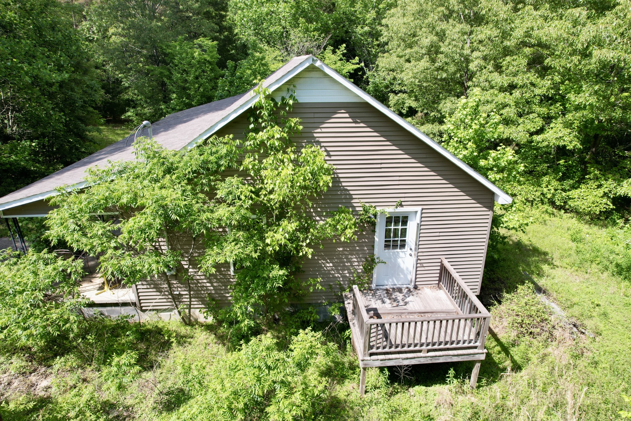 228 Henryville Road Ethridge, TN 38456 - Photo 6 of 55 a view of a house with a balcony