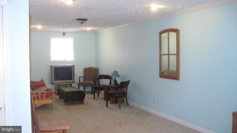 11316 Rawhide Road Lusby, MD 20657 - Photo 19 of 29 a workspace with furniture and window