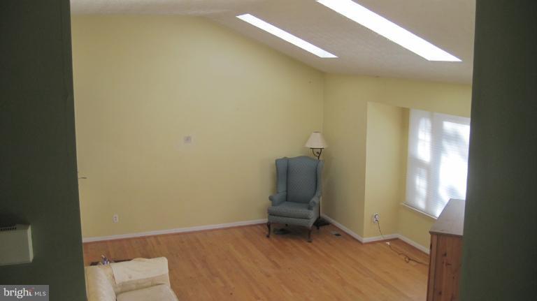 11316 Rawhide Road Lusby, MD 20657 - Photo 26 of 29 a view of room with window and hallway