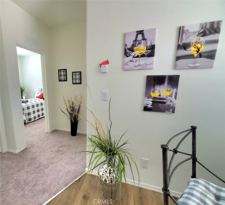 21621 Sandia Road, Unit 138 Apple Valley, CA 92308 - Photo 22 of 38 a view of living room with furniture and flowers
