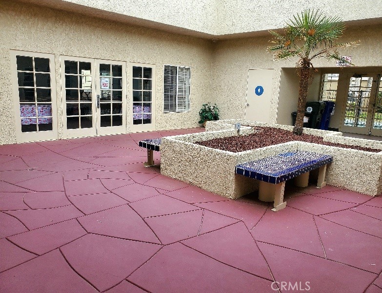 21621 Sandia Road, Unit 138 Apple Valley, CA 92308 - Photo 31 of 38 a swimming pool with outdoor seating