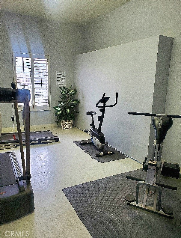 21621 Sandia Road, Unit 138 Apple Valley, CA 92308 - Photo 33 of 38 a view of a room with gym equipment
