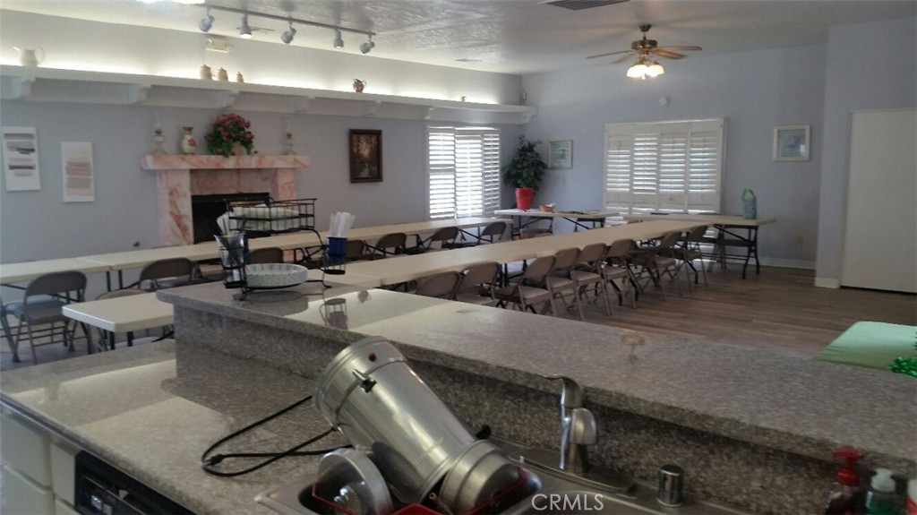 21621 Sandia Road, Unit 138 Apple Valley, CA 92308 - Photo 34 of 38 a living room with furniture and a wooden floor
