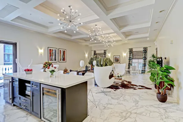 a work room with furniture and wooden floor