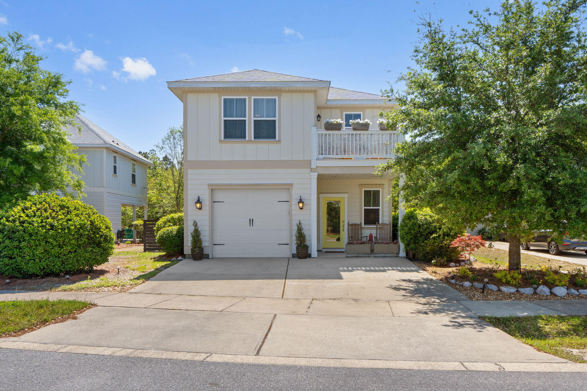 160 Montclair Avenue Santa Rosa Beach, FL 32459 - Photo 2 of 48 a front view of a house with a yard