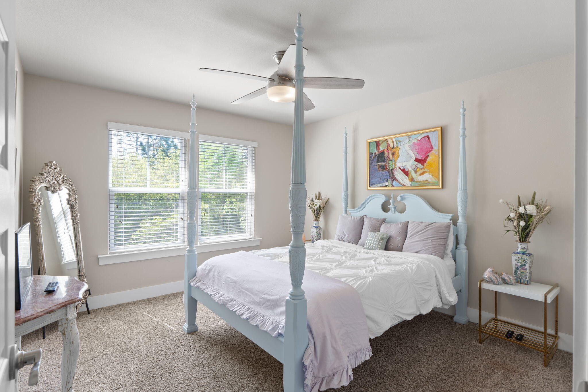 160 Montclair Avenue Santa Rosa Beach, FL 32459 - Photo 23 of 48 a bedroom with a bed a window and a chandelier