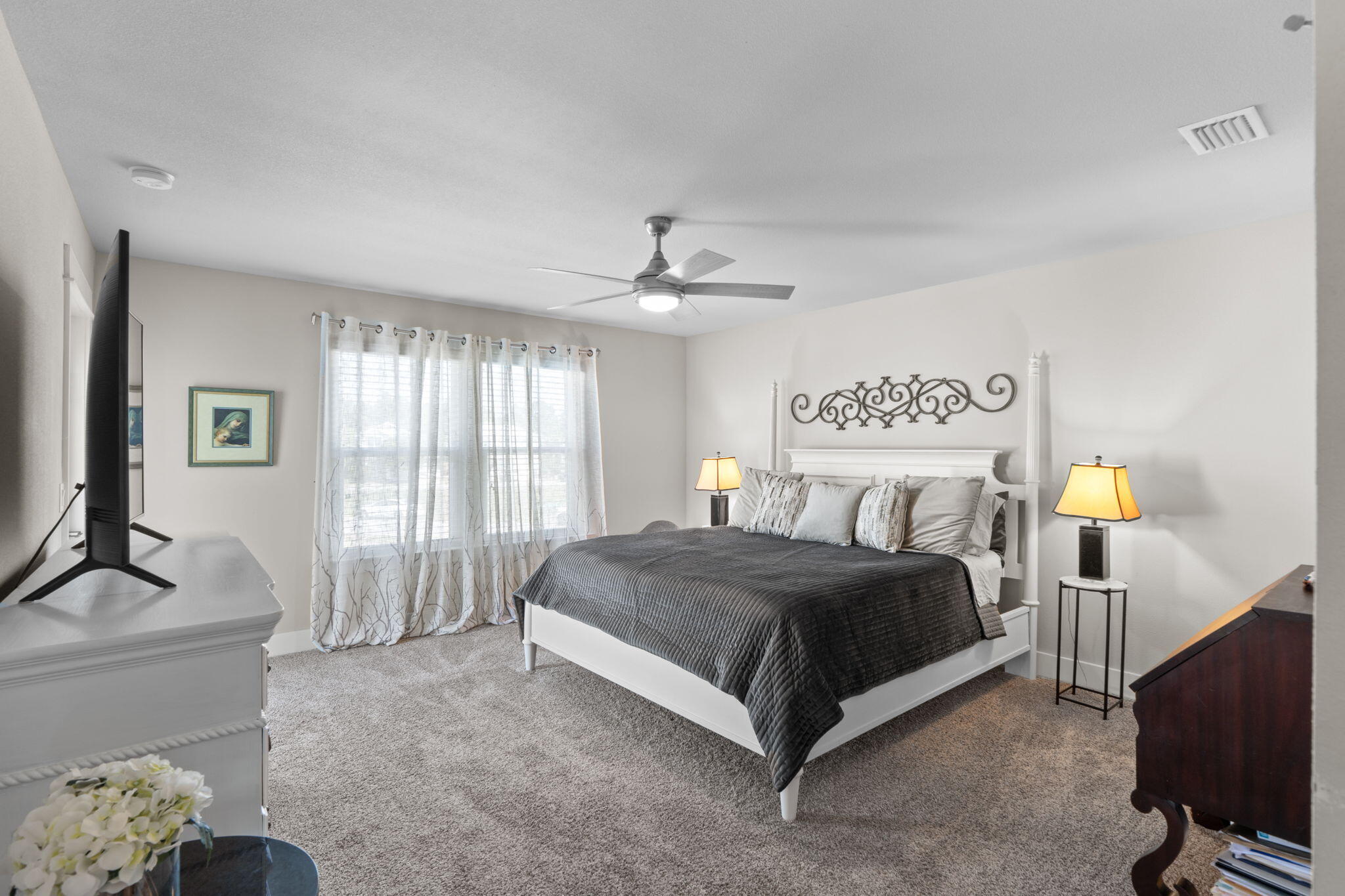 160 Montclair Avenue Santa Rosa Beach, FL 32459 - Photo 29 of 48 a spacious bedroom with a bed and a couch