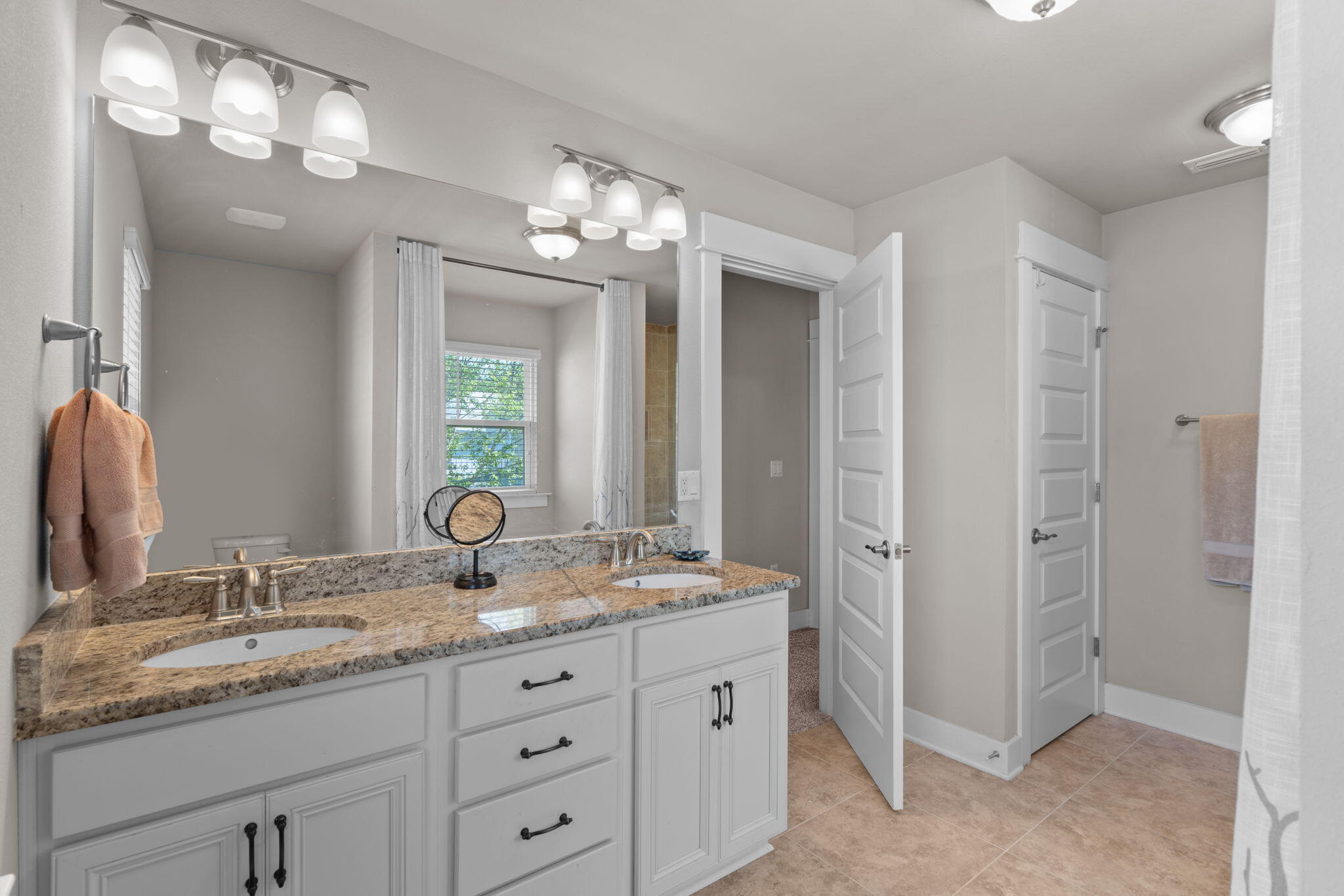 160 Montclair Avenue Santa Rosa Beach, FL 32459 - Photo 34 of 48 a bathroom with double sink and a mirror