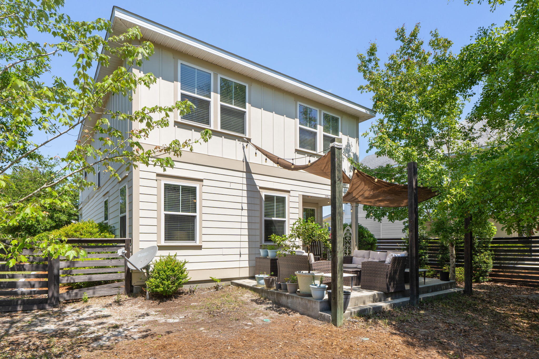 160 Montclair Avenue Santa Rosa Beach, FL 32459 - Photo 41 of 48 a view of a house with backyard and sitting area