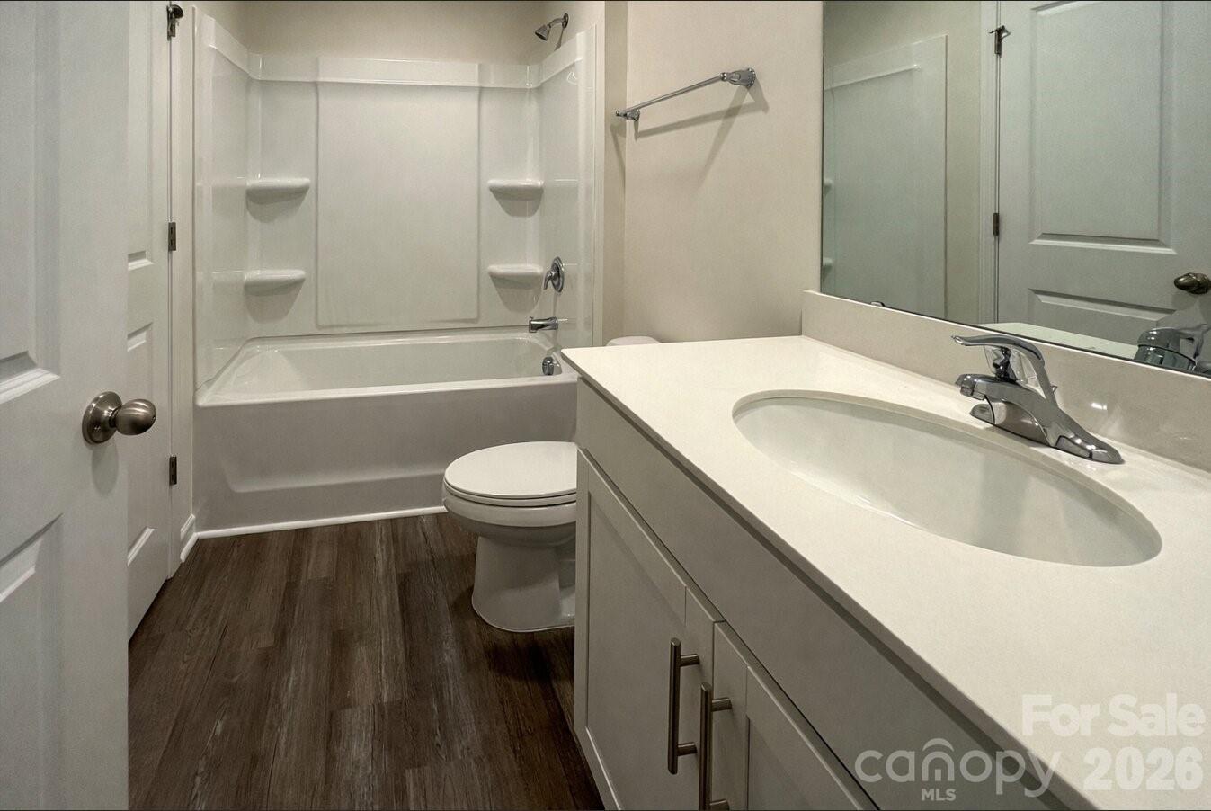 6109 Faron Way Charlotte, NC 28262 - Photo 15 of 23 a bathroom with a sink and a bathtub