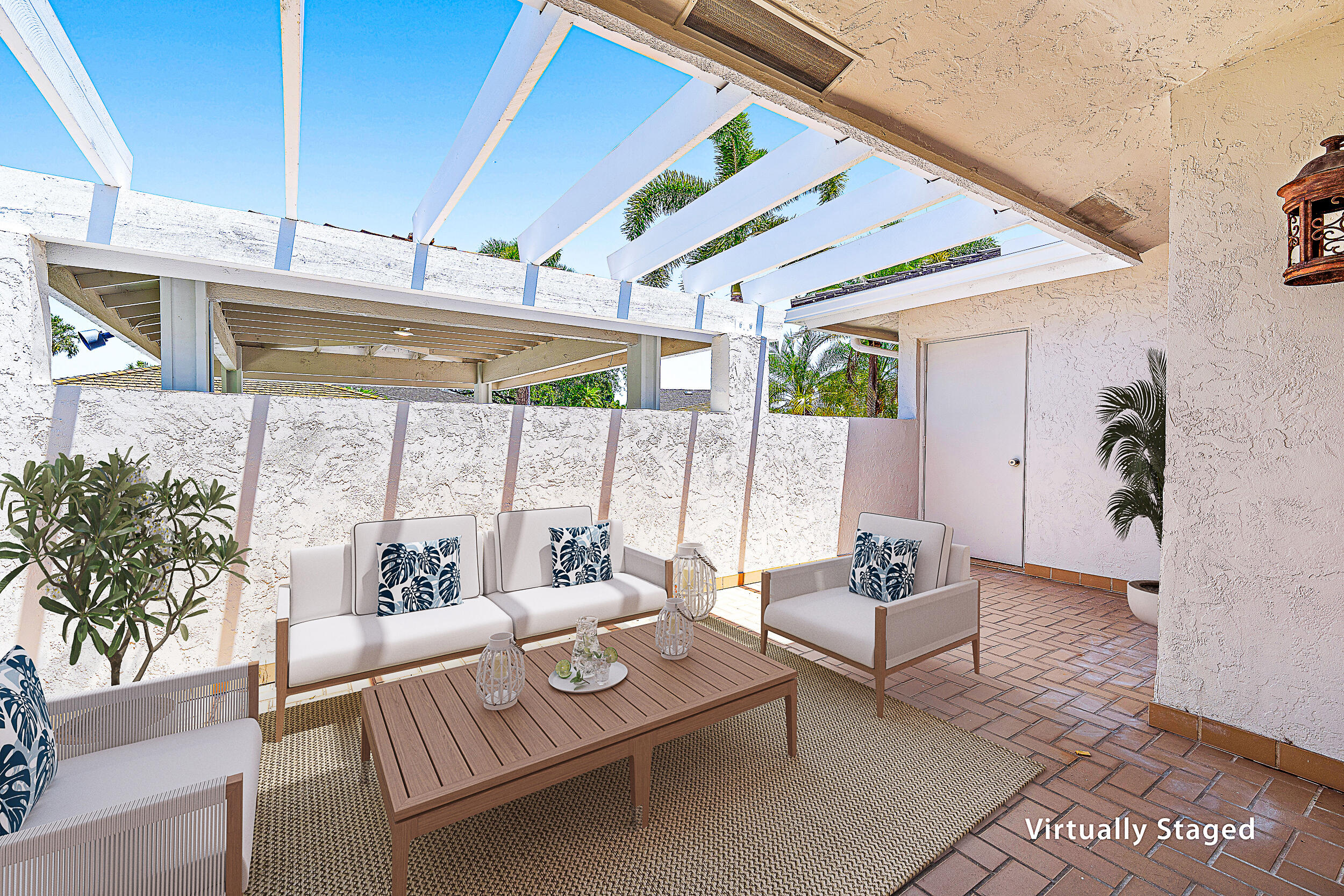 Undisclosed Address Jupiter, FL 33477 - Photo 14 of 30 a outdoor space with patio the couches and a dining table with the garden view