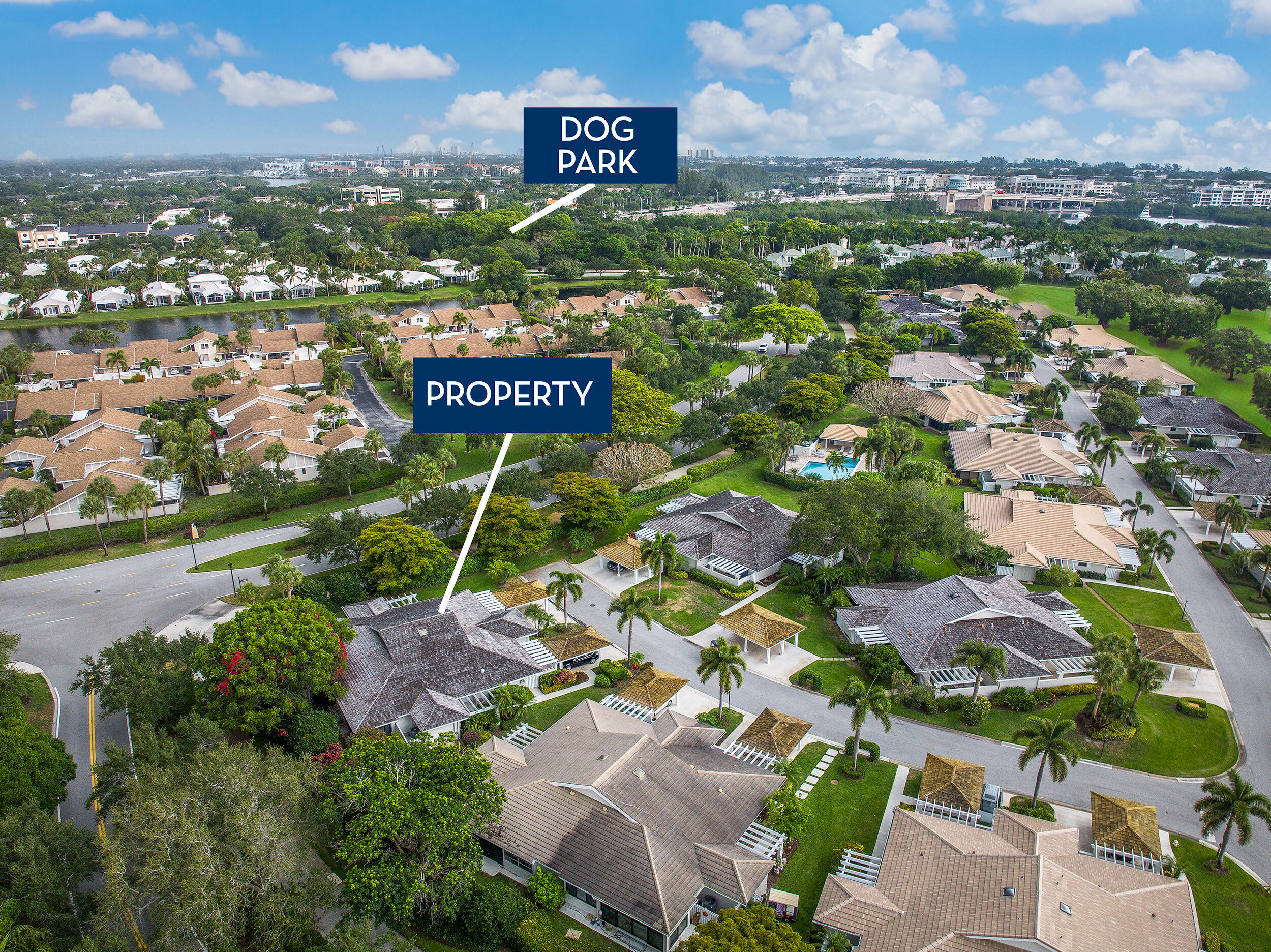 Undisclosed Address Jupiter, FL 33477 - Photo 3 of 30 an aerial view of residential houses with outdoor space and parking