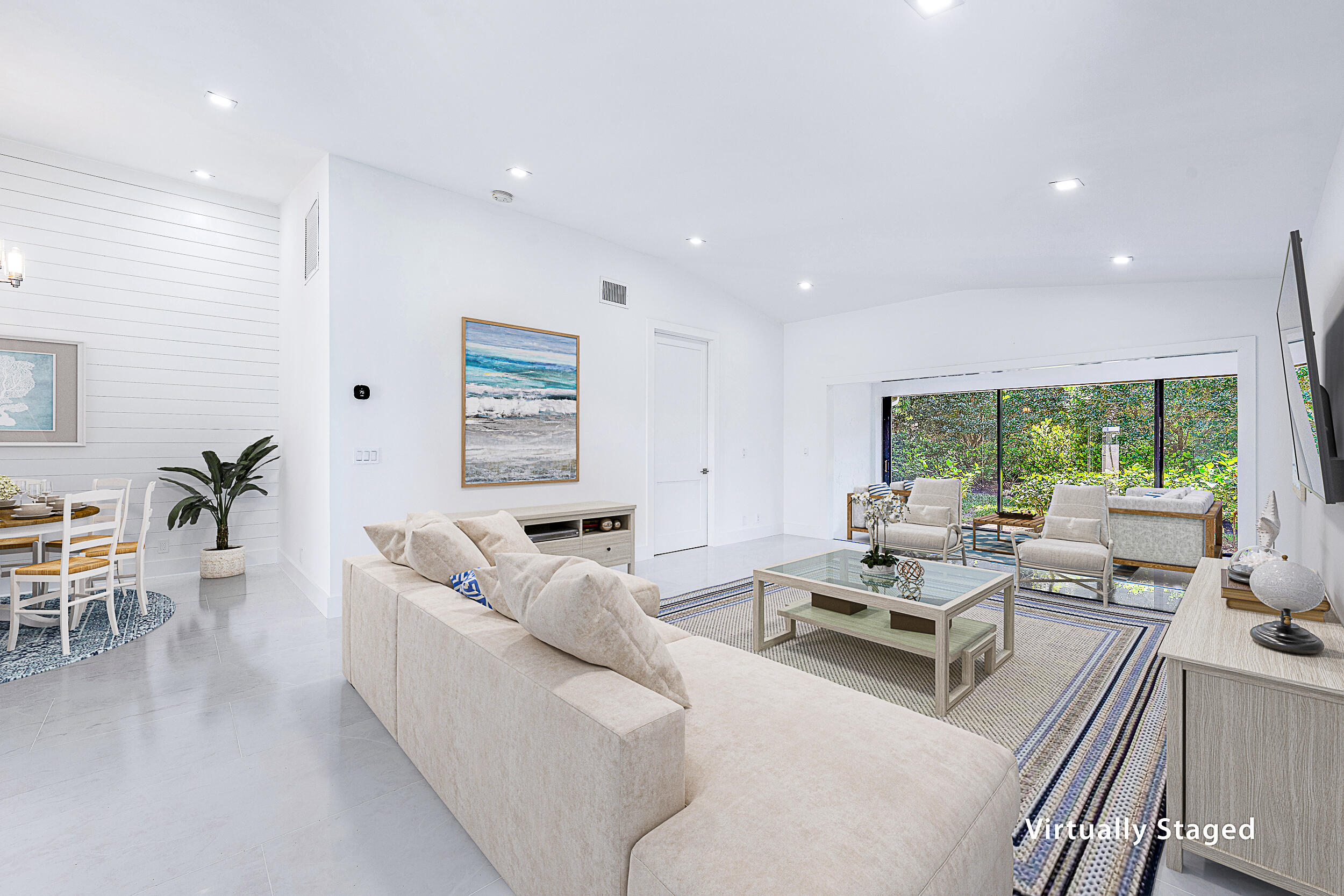 Undisclosed Address Jupiter, FL 33477 - Photo 6 of 30 a living room with furniture wooden floor and a large window