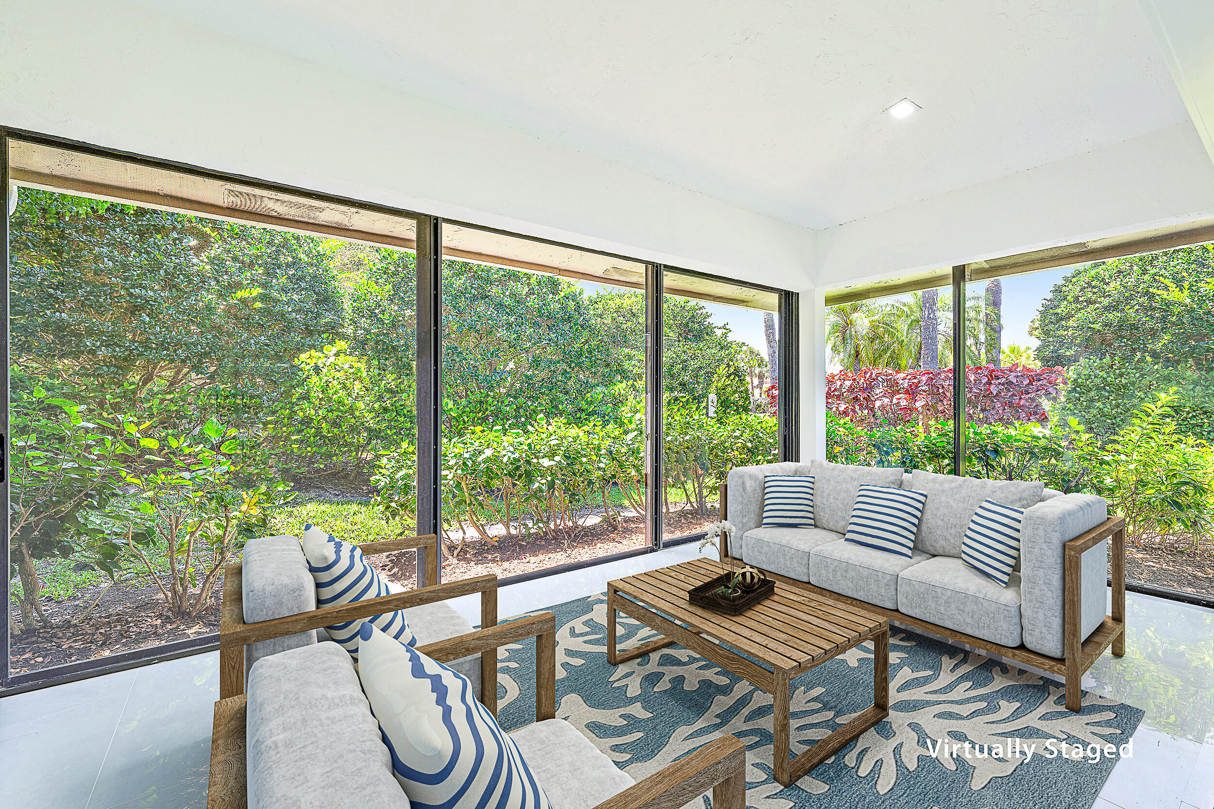 Undisclosed Address Jupiter, FL 33477 - Photo 8 of 30 a living room with furniture and floor to ceiling windows