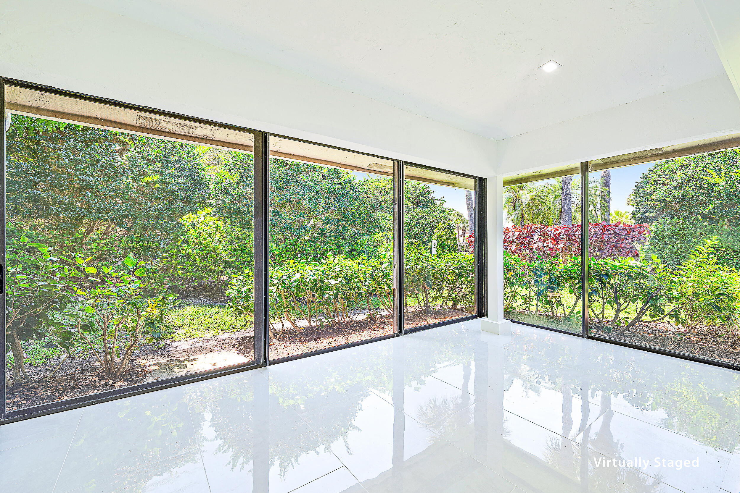 Undisclosed Address Jupiter, FL 33477 - Photo 9 of 30 a view of a garden and mountain view