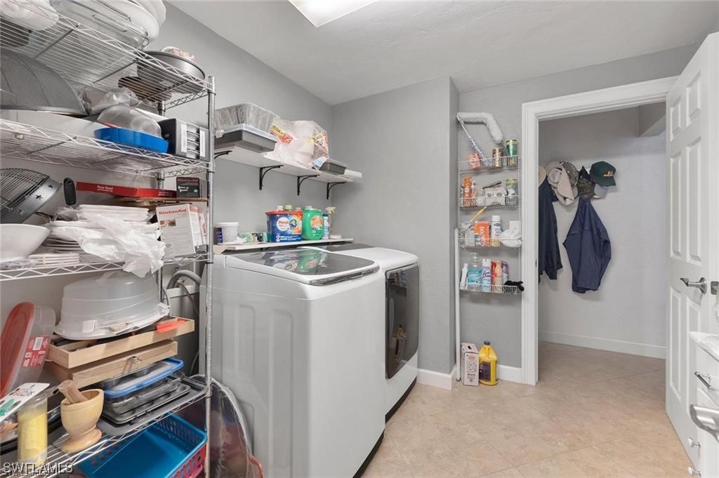 13951 River Road Fort Myers, FL 33905 - Photo 20 of 34 a utility room with dryer and washer