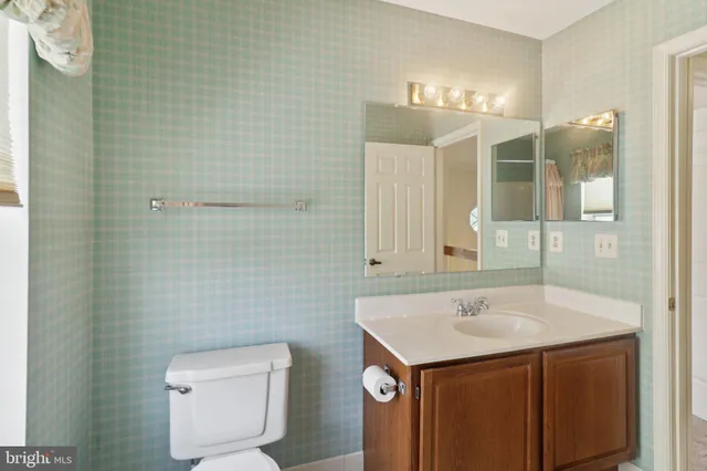 a view of house with a big yard