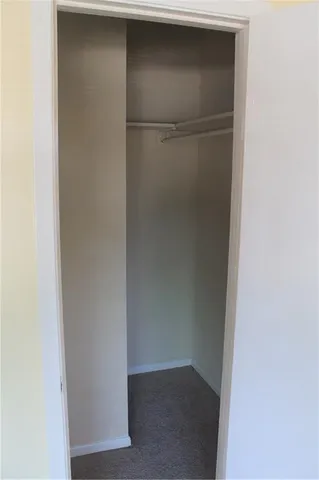 a view of a closet in a room