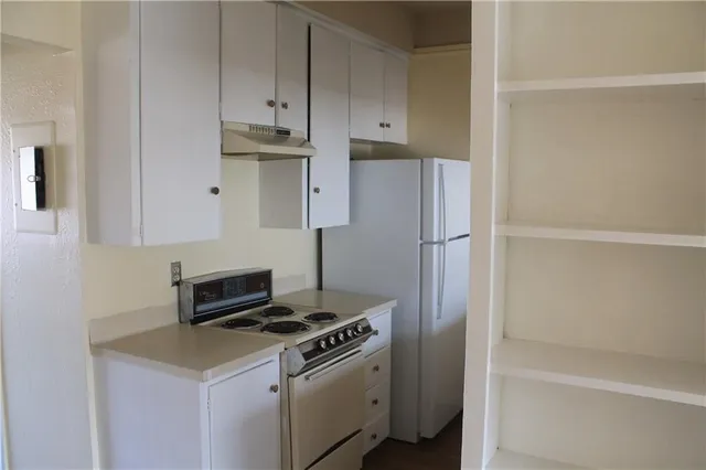 a balcony with view of nearby houses