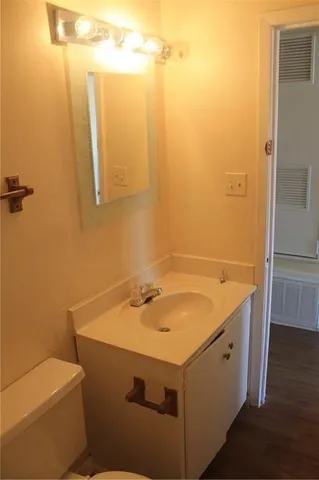 a bathroom with a sink and a toilet
