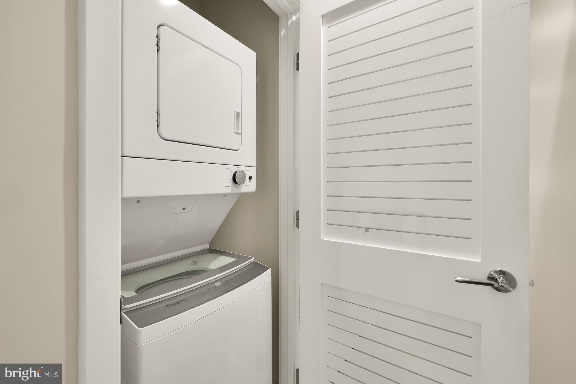 58 T Street Northwest, Unit 1 Washington, DC 20001 - Photo 19 of 27 a utility room with a washer and dryer