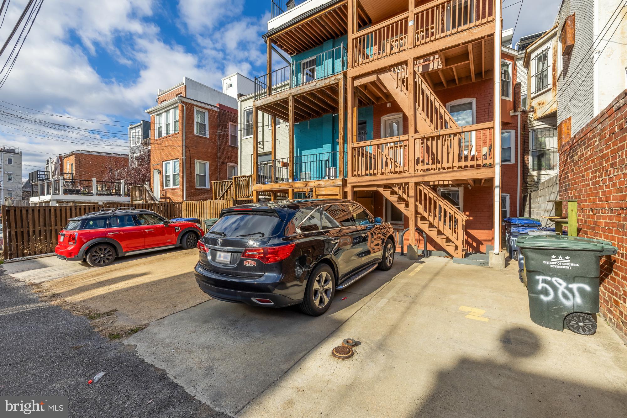 58 T Street Northwest, Unit 1 Washington, DC 20001 - Photo 20 of 27 a car parked in front of a house
