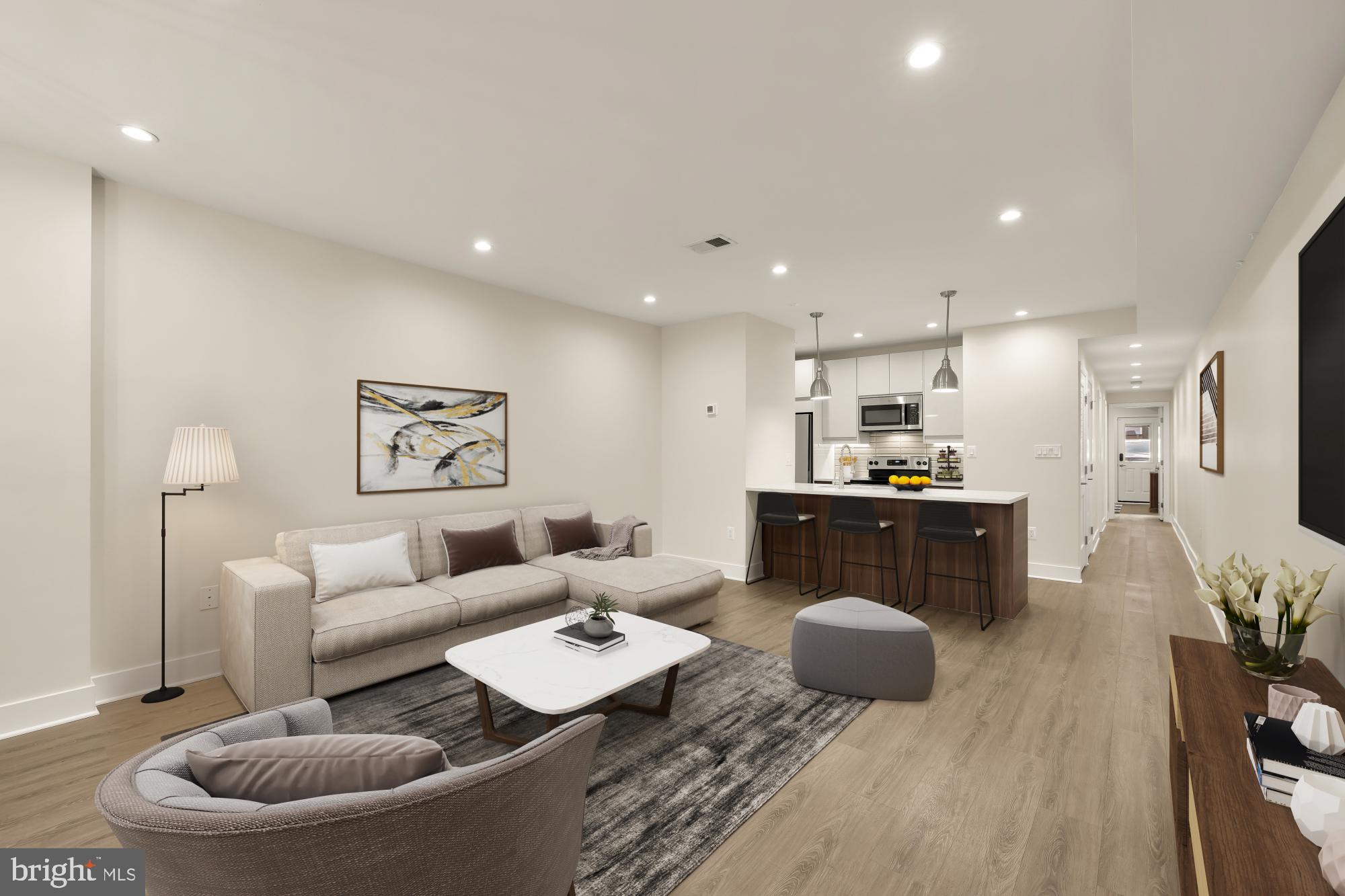 58 T Street Northwest, Unit 1 Washington, DC 20001 - Photo 3 of 27 a living room with furniture and a wooden floor
