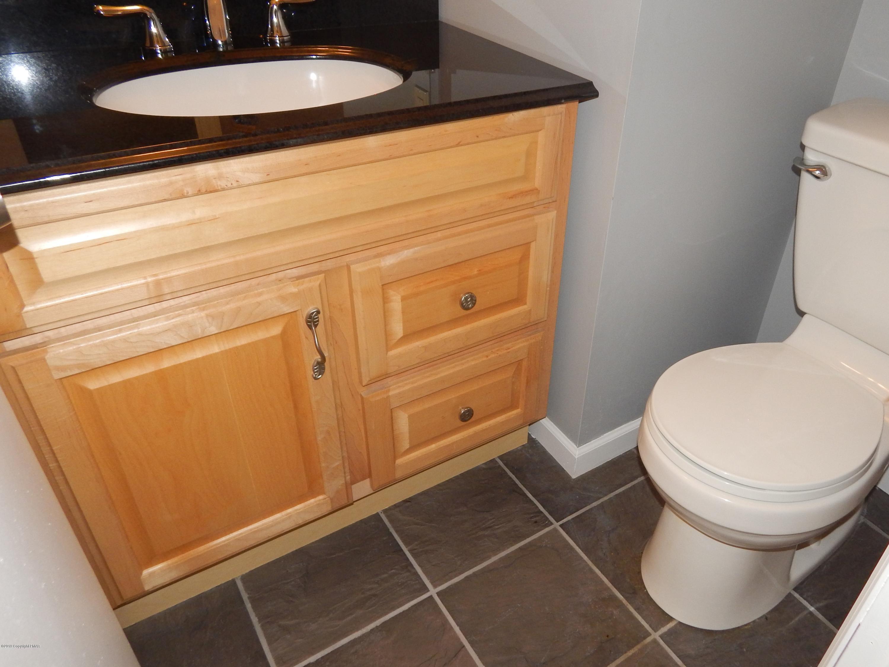 227 Kit Carson Circle Pocono Pines, PA 18350 - Photo 16 of 42 #16-Sapinski Updated Powder Room