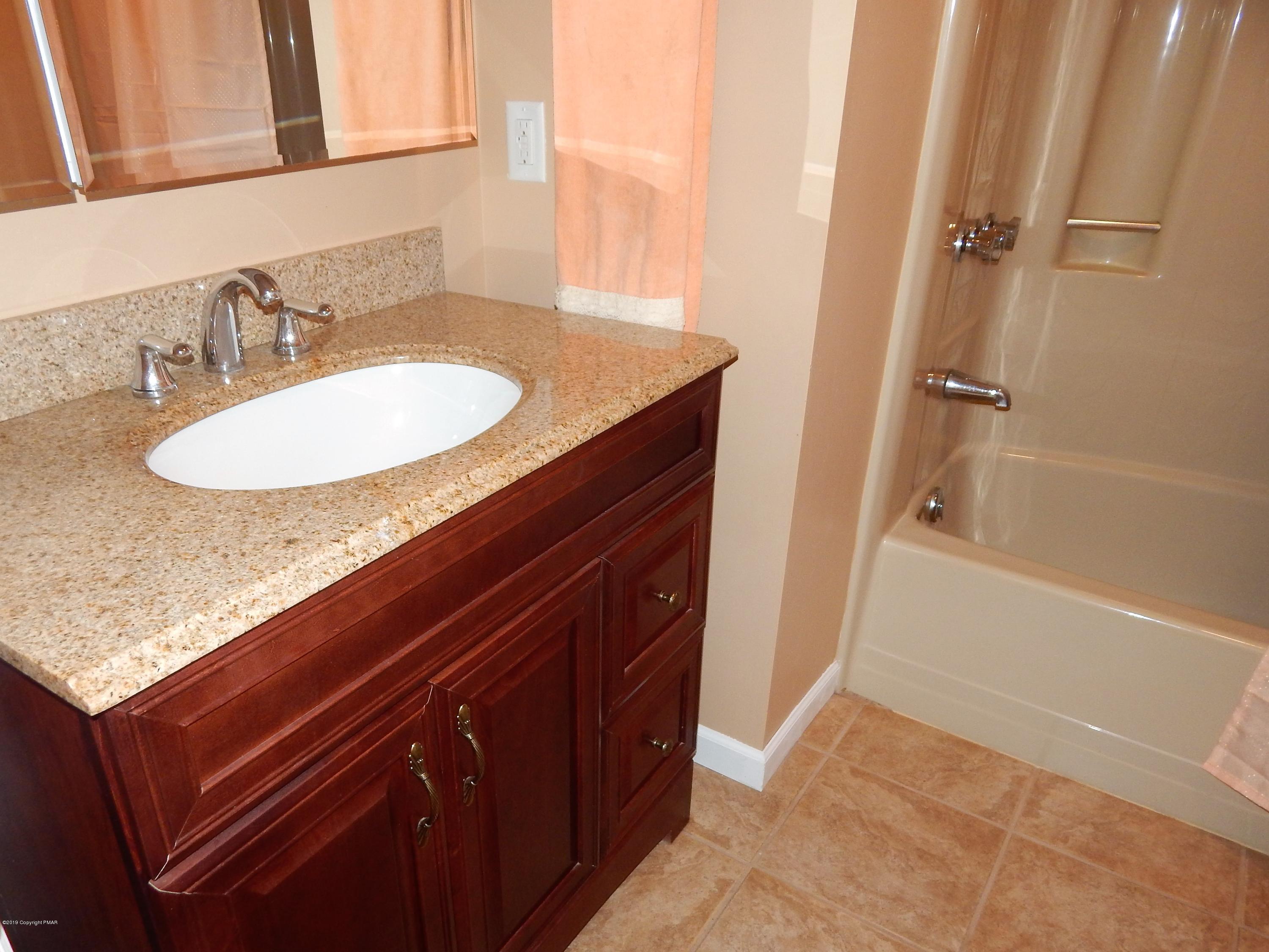 227 Kit Carson Circle Pocono Pines, PA 18350 - Photo 18 of 42 #18-Sapinski Updated Full Bath