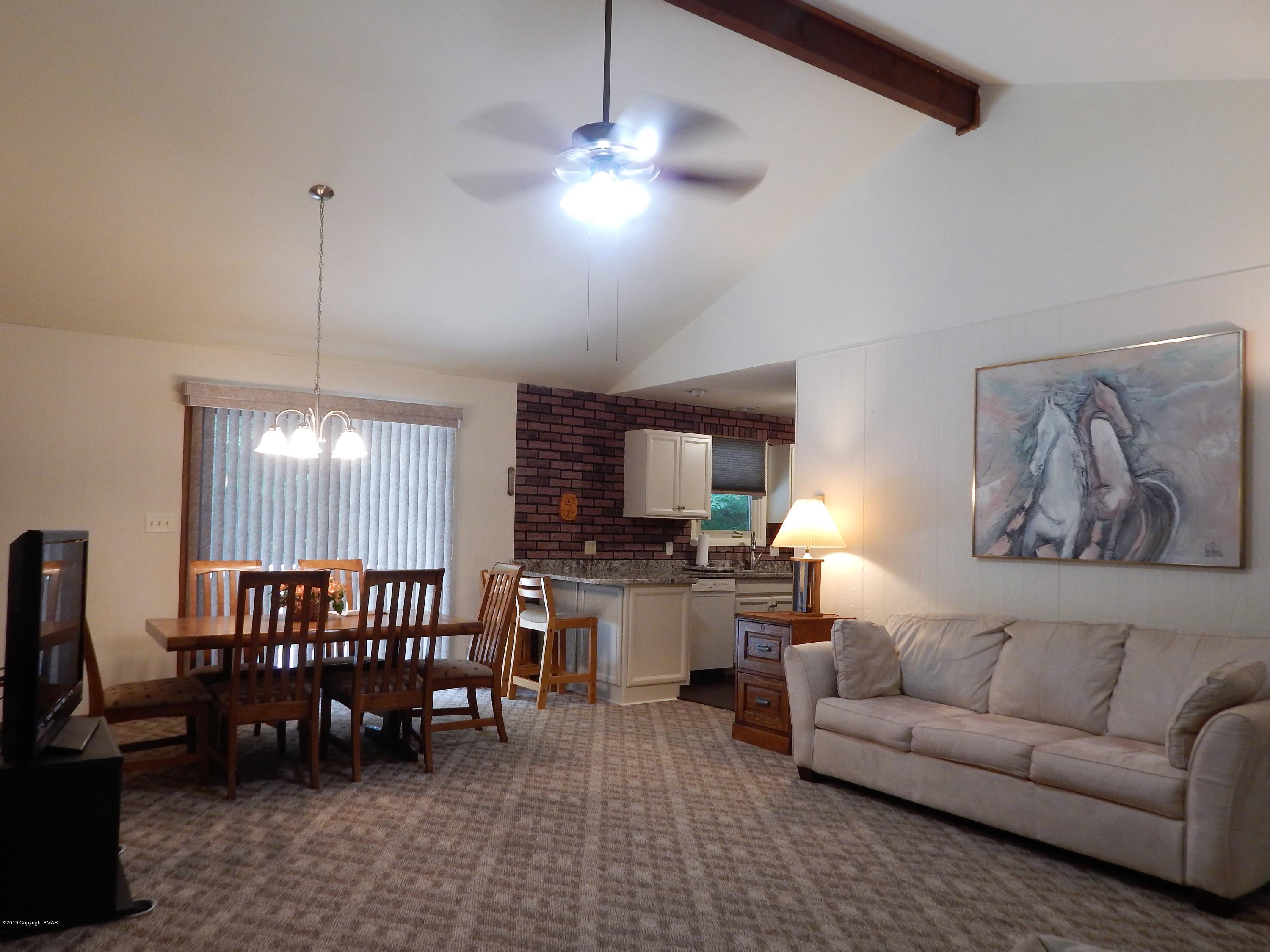 227 Kit Carson Circle Pocono Pines, PA 18350 - Photo 5 of 42 #5-Sapinski Living-Dining Room View #2