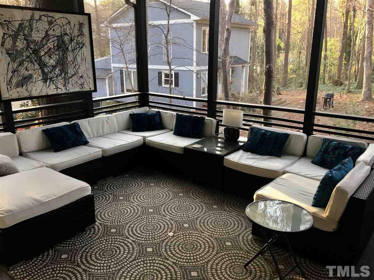 2955 Rue Sans Famille Raleigh, NC 27607 - Photo 14 of 21 a living room with furniture and a rug