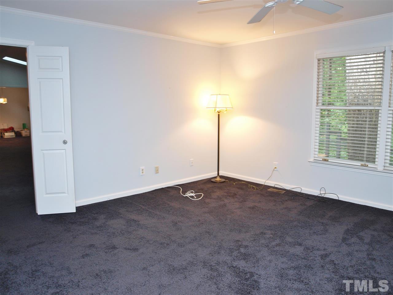 2955 Rue Sans Famille Raleigh, NC 27607 - Photo 9 of 21 a view of an empty room with a window
