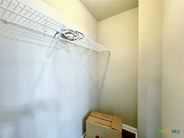 a bathroom with a toilet and sink