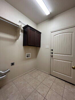 3205 112th Street Lubbock, TX 79423 - Photo 8 of 19 a bathroom with a shower and a toilet