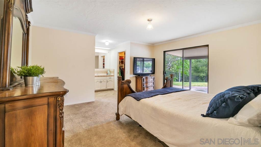 12842 Stone Canyon Road Poway, CA 92064 - Photo 12 of 25 Sliding glass doors leading out to the backyard and patio area. Light and Bright.