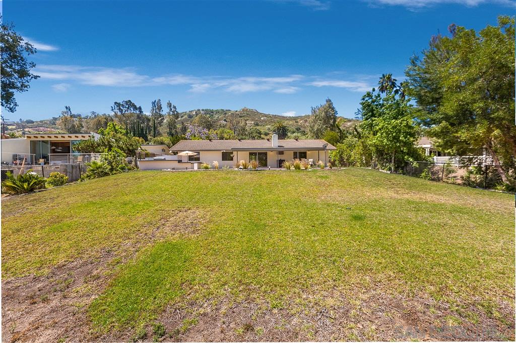 12842 Stone Canyon Road Poway, CA 92064 - Photo 22 of 25 Huge grassy lawn with horeshoe pit, mature trees, bbq, patio nad swimming pool/spa