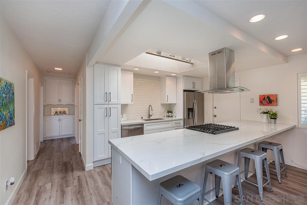 12842 Stone Canyon Road Poway, CA 92064 - Photo 7 of 25 Huge 4 seater Island in Quartz calccuta countertop