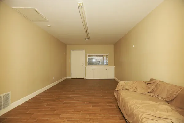 a view of a bedroom with a bed