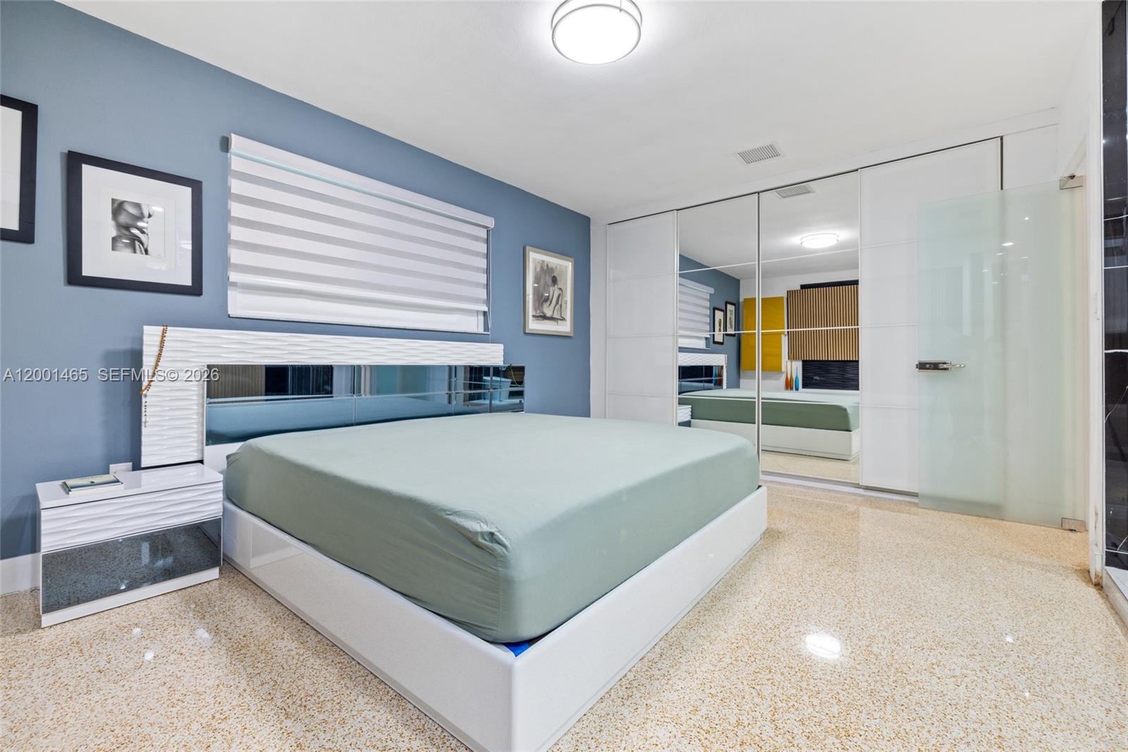 2121 Red Road Miami, FL 33155 - Photo 19 of 37 a bedroom with a large bed and a large window