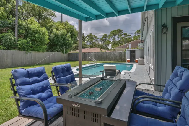 a view of a house with swimming pool