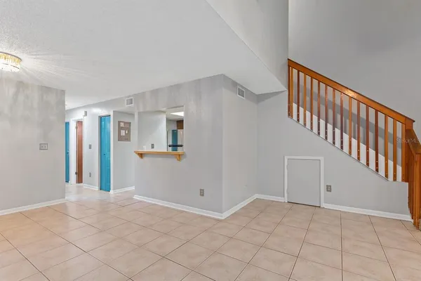 a view of an empty room and window