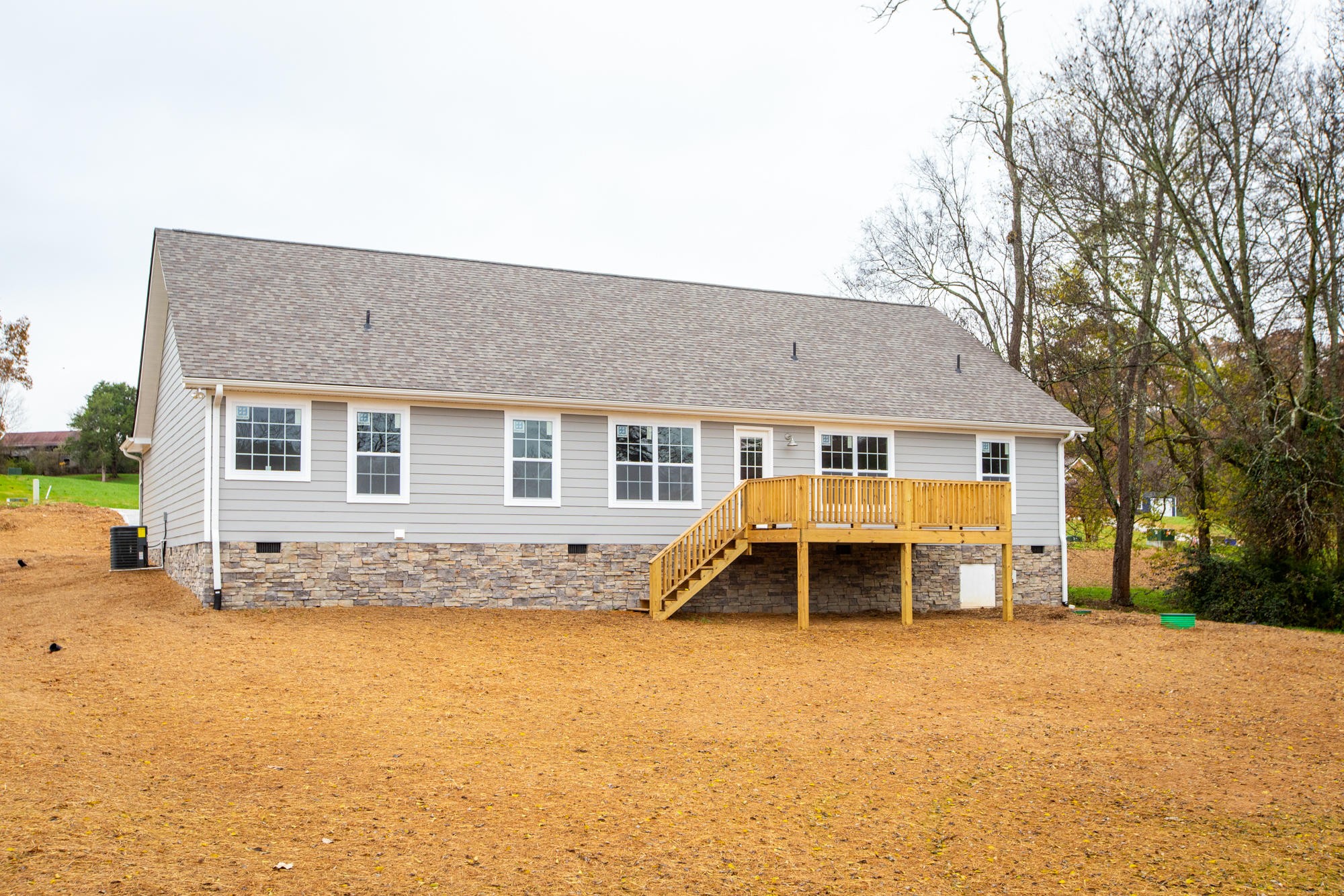 928 Houston Springs Road Greenback, TN 37742 - Photo 30 of 31 a front view of a house with a yard and garage