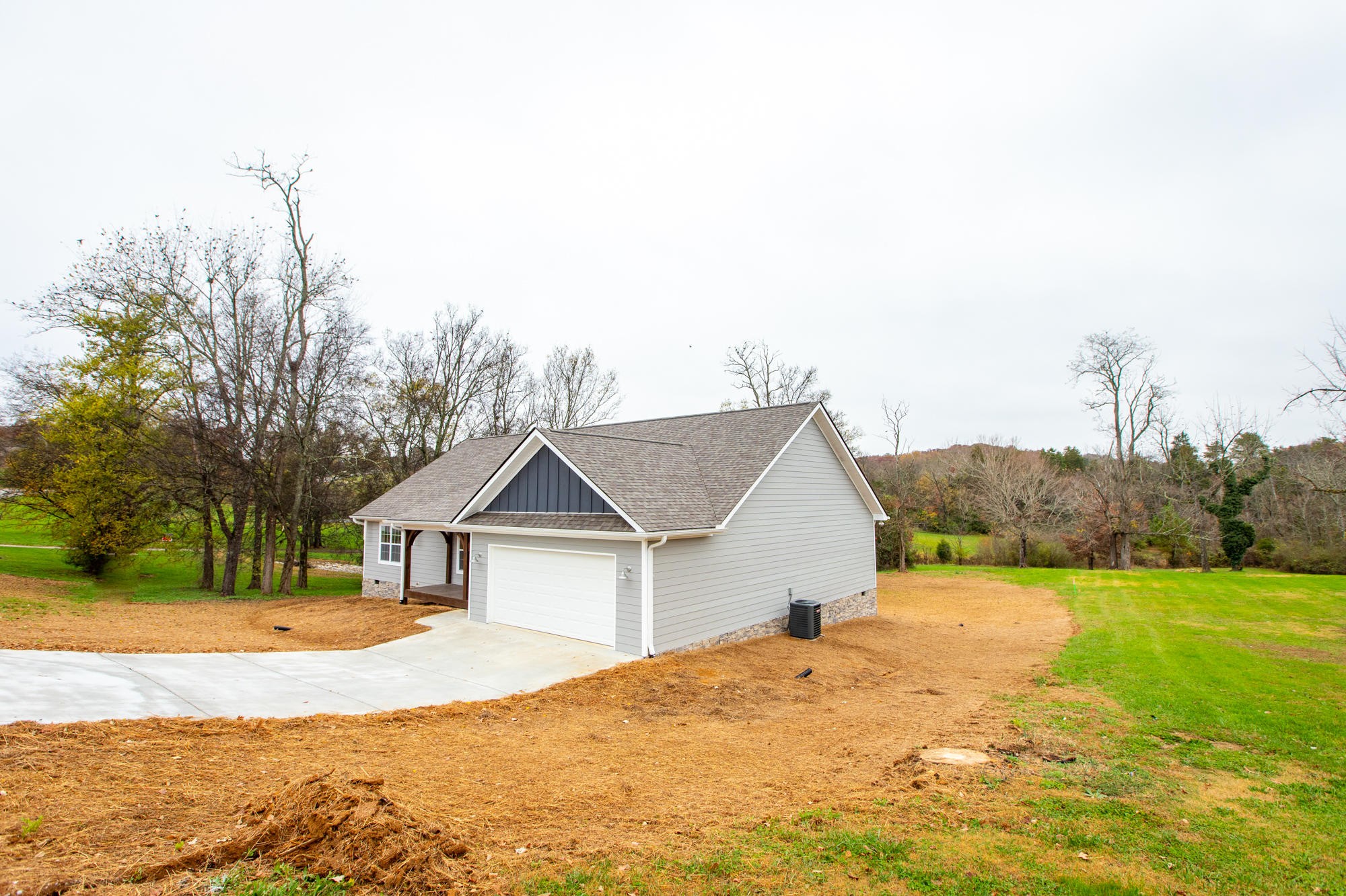928 Houston Springs Road Greenback, TN 37742 - Photo 3 of 31 a view of a house with a yard and large tree