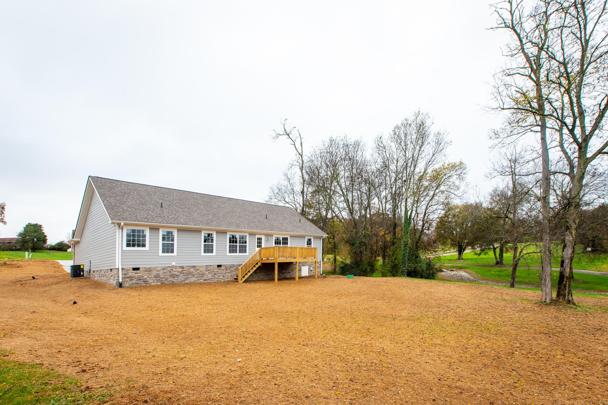 928 Houston Springs Road Greenback, TN 37742 - Photo 4 of 31 a front view of a house with a yard
